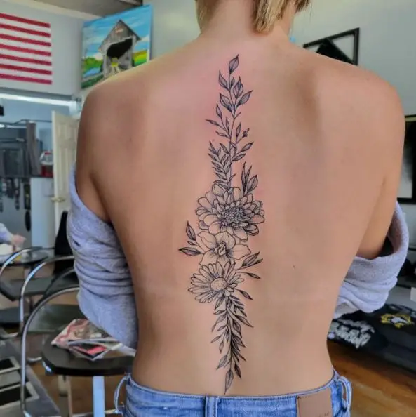 Grey Flowers and Leaves Spine Tattoo