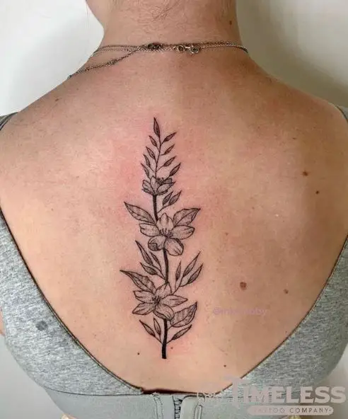 Grey Flowers with Leaves Spine Tattoo