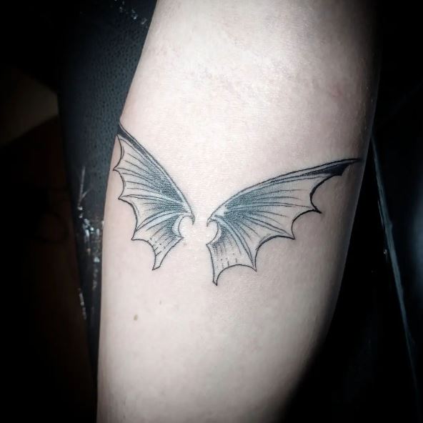 Shaded Bat Wings Arm Tattoo