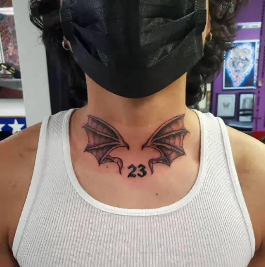 23 and Bat Wings Neck Tattoo