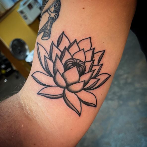 Black Bold Minimalistic Water Lily Biceps Tattoo