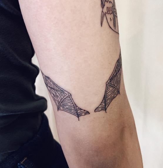 Small Bat Wings Elbow Tattoo