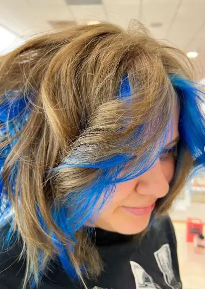 Blonde Haircut with Royal Blue Fringe