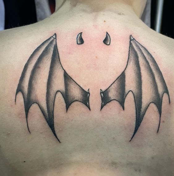 Devil Horns and Bat Wings Back Tattoo