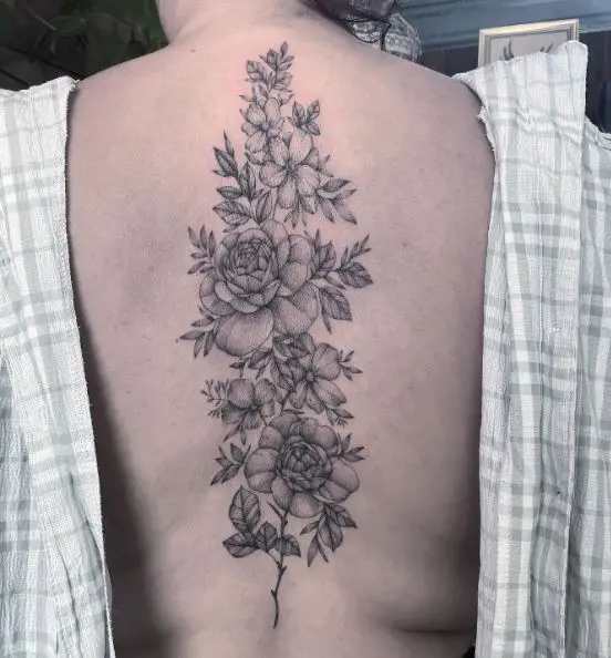 Branch with Flowers and Leaves Spine Tattoo