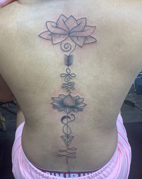 Ornaments and Lotus Spine Tattoo