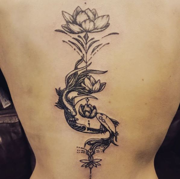 Fishes and Lotus Flowers Spine Tattoo