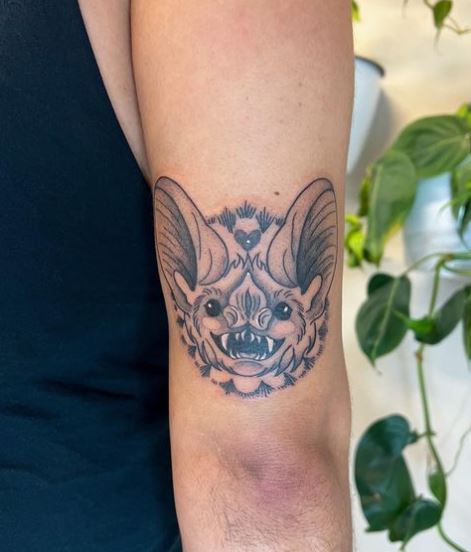 Spooky Little Bat Elbow Tattoo