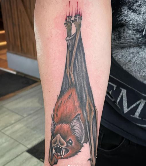 Colored Hanging Vampire Bat Arm Tattoo