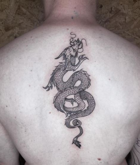 Grey Dragon Spine Tattoo
