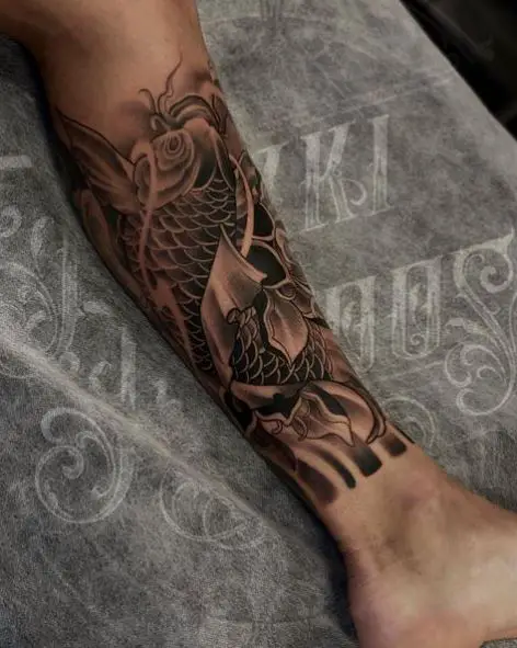 Black and Grey Koi Fish Leg Sleeve Tattoo
