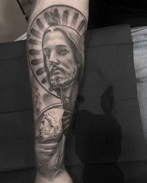 Black and Grey San Judas Arm Tattoo
