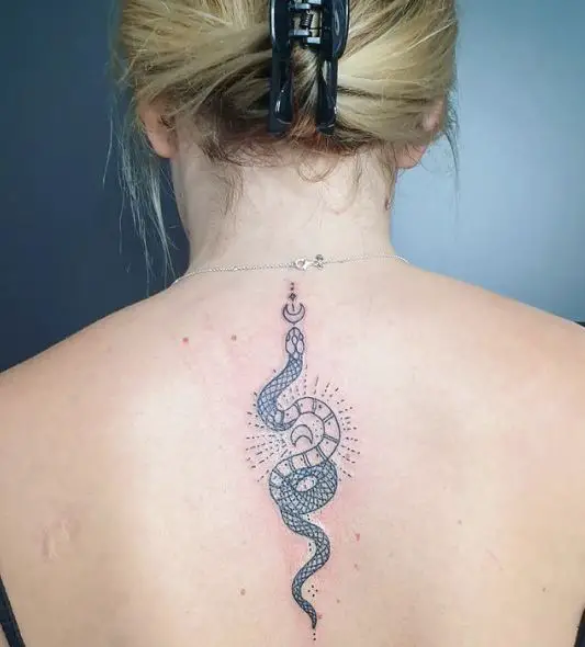 Grey Half Moon and Snake Spine Tattoo