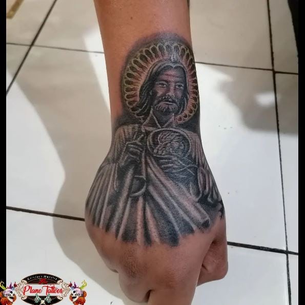 Black San Judas Hand Tattoo