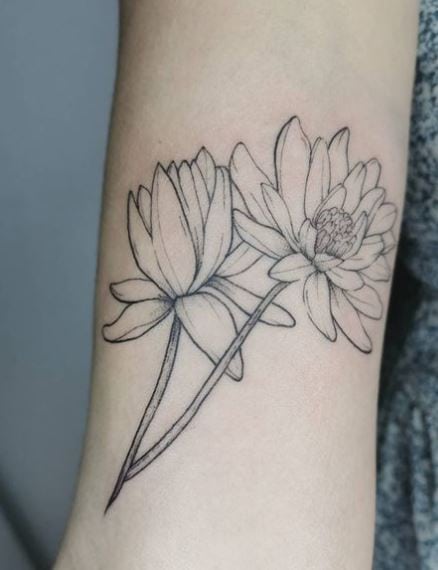 Two Grey Shaded Minimalistic Water Lilies Wrist Tattoo