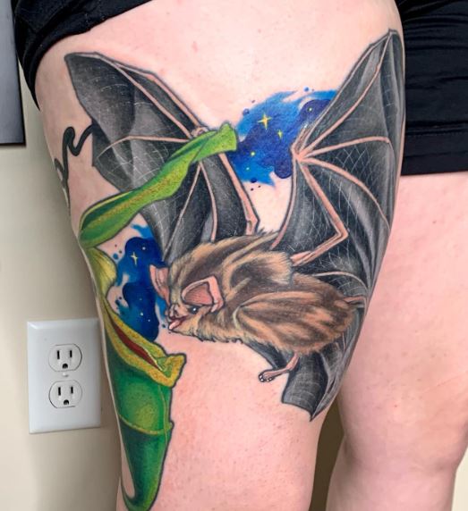 Colorful Vampire Bat Thigh Tattoo