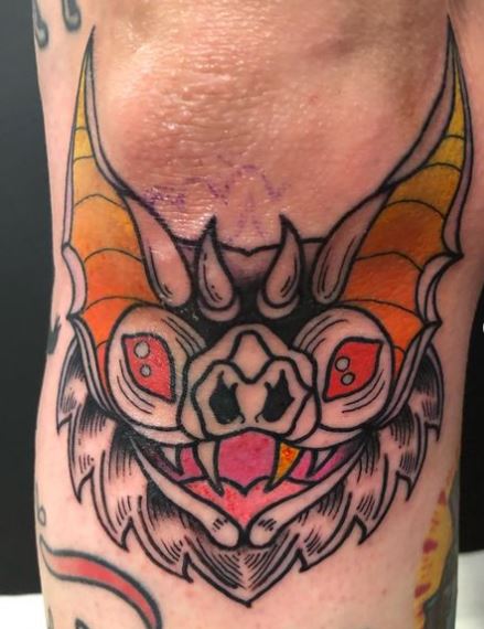 Bat with Red Eyes Knee Tattoo