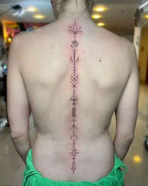Ornament with Symbols Spine Tattoo