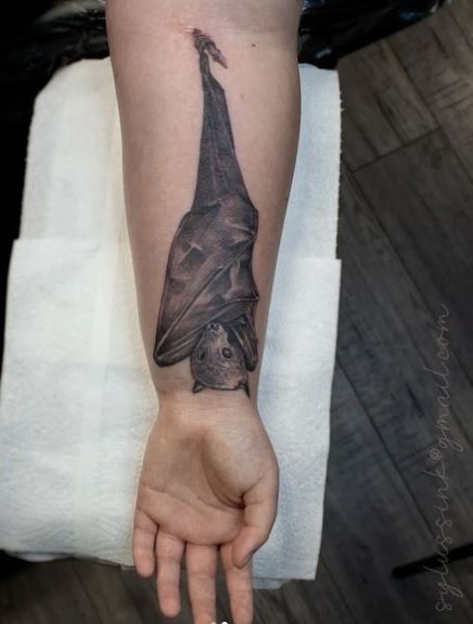 Wrapped Bat Forearm Tattoo