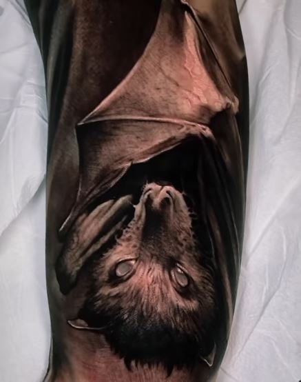 Realistic Fruit Bat Arm Tattoo