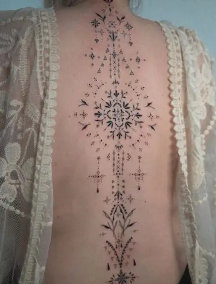 Symmetrical Ornamental Spine Tattoo