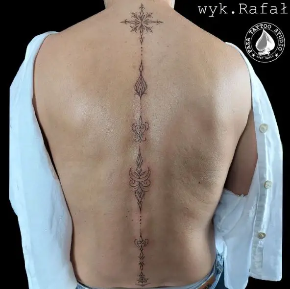 Black Symmetrical Ornament Spine Tattoo