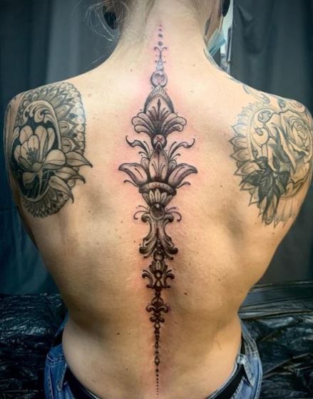 Black and Grey Ornamental Spine Tattoo