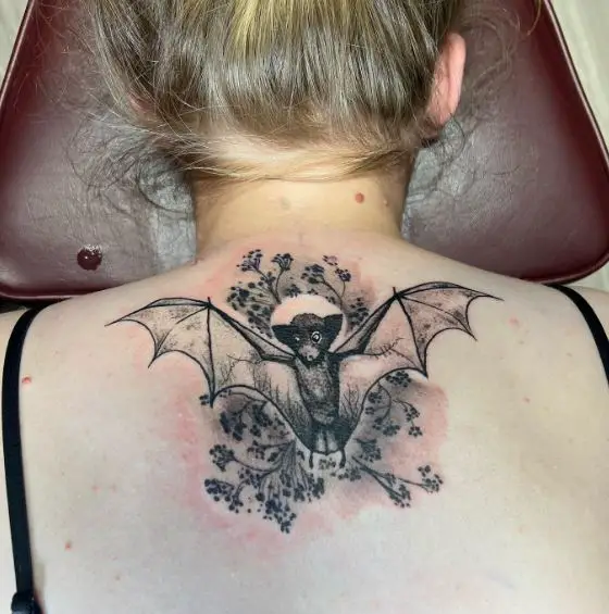 Small Fruits and Bat Back Tattoo