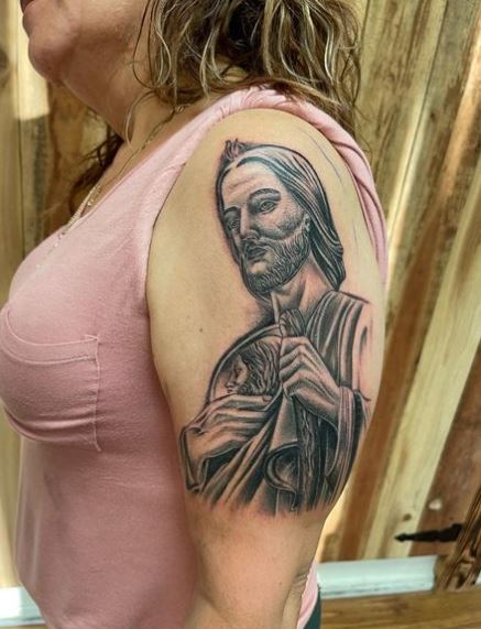 San Judas without Halo Biceps Tattoo
