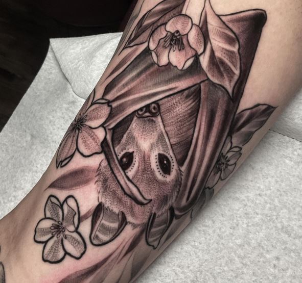 Baby Bat with Flowers Arm Tattoo