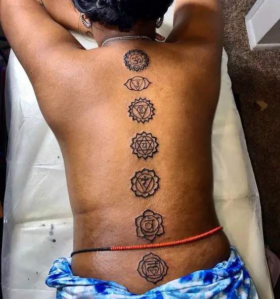 Chakra Symbols Spine Tattoo