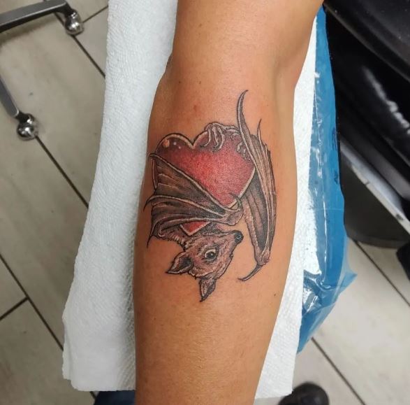 Strawberry and Bat Arm Tattoo