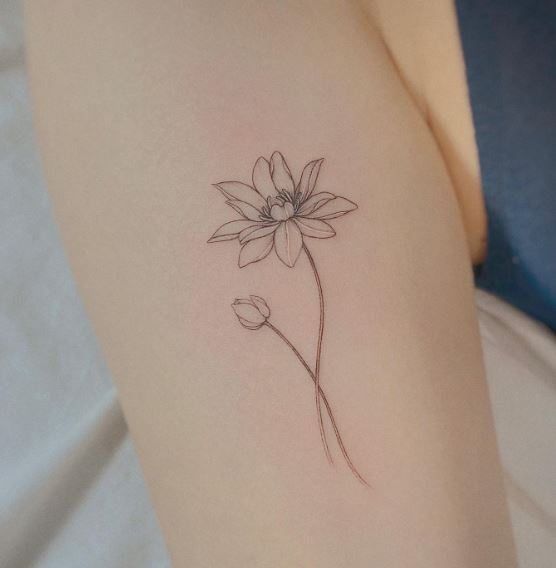 Two Small Water Lilies Biceps Tattoo