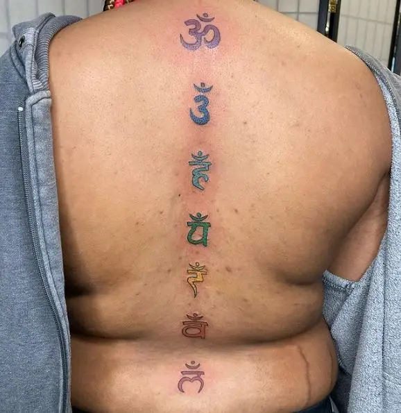 Colored Chakra Symbols Spine Tattoo