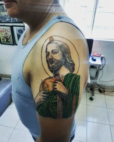 San Judas in Green Clothes Arm Tattoo