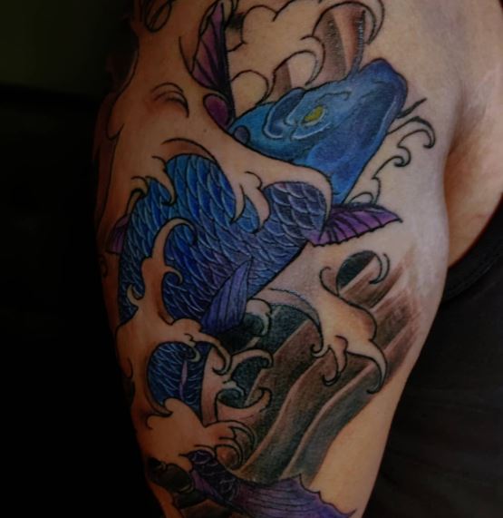 Waves on Blue Koi Fish Arm Tattoo