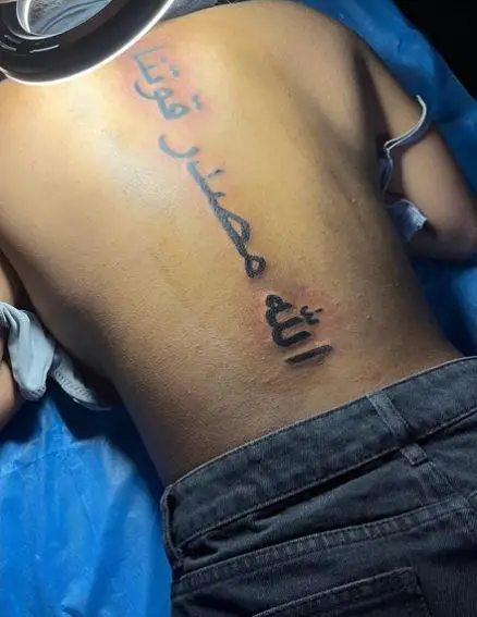 Arabic Text Spine Tattoo