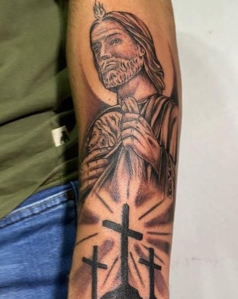 Grey Crucifixion and San Judas Arm Tattoo