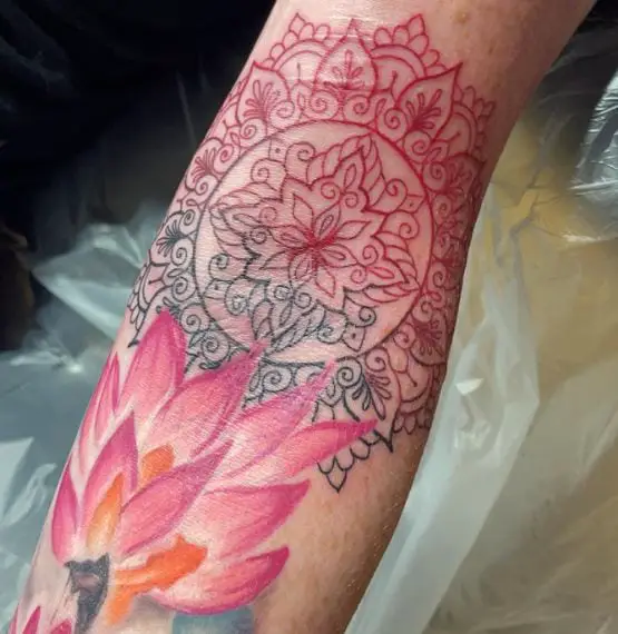 Colorful Water Lily Arm Tattoo with Ornament