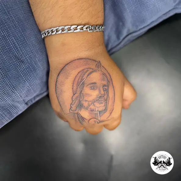 Grey San Judas Hand Tattoo