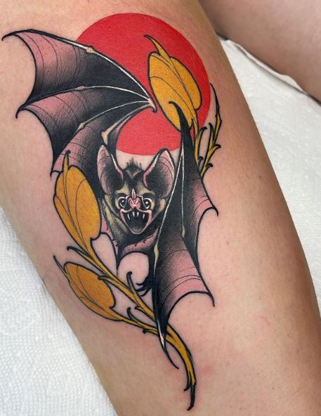 Leaves and Vampire Bat Arm Tattoo