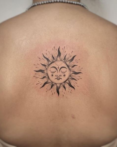 Sleeping Sun Spine Tattoo