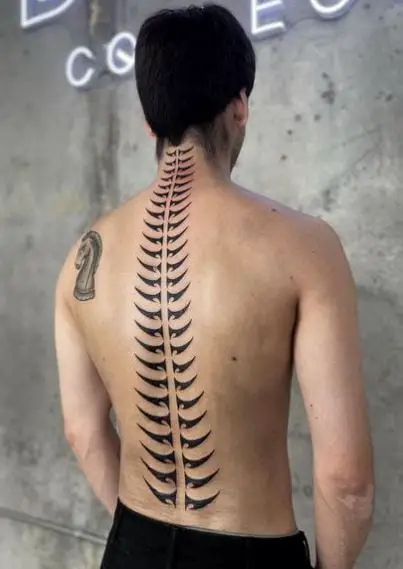 Tribal Inspired Vertebral Column Spine Tattoo