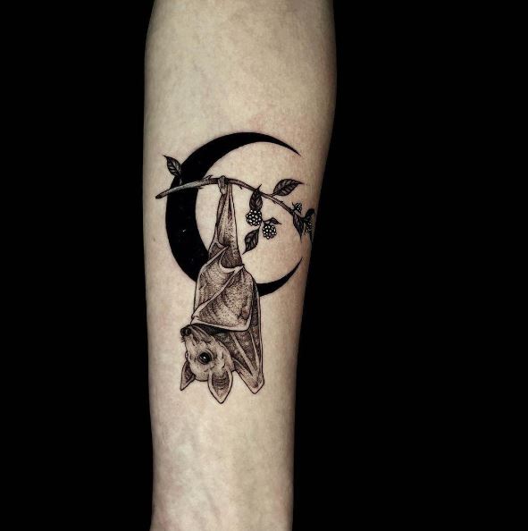 Half Moon and Hanging Bat Arm Tattoo