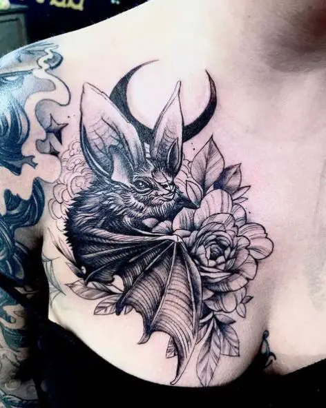 Flower and Bat Chest Tattoo