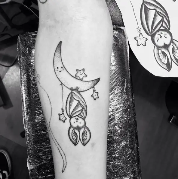 Moon with Hanging Bat Arm Tattoo