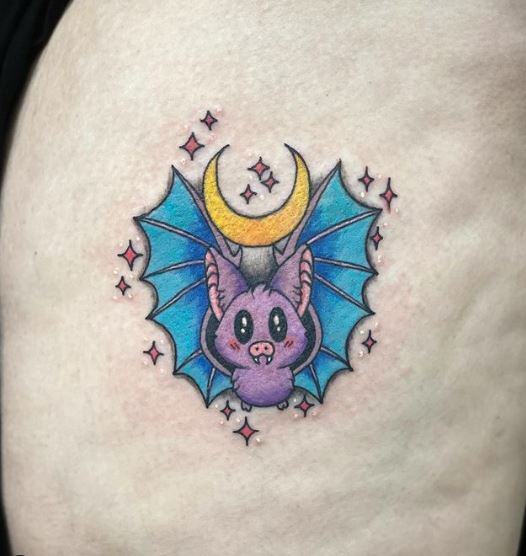 Colored Moon and Bat Thigh Tattoo