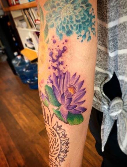 Colorful Traditional Water Lily and Lily Pad Arm Tattoo