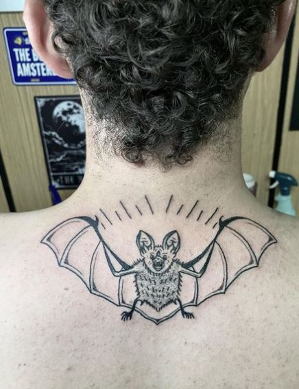 Black Flying Bat Back Tattoo