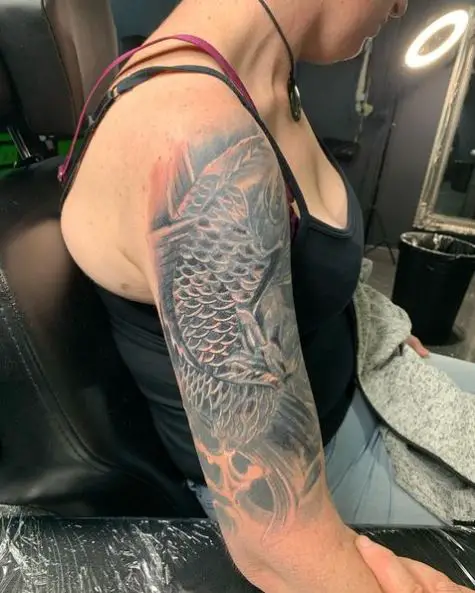 Black & Grey Koi Fish Arm Tattoo